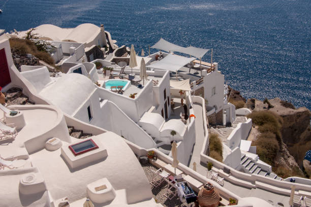 istock pretty white houses on Santorini 1095596880