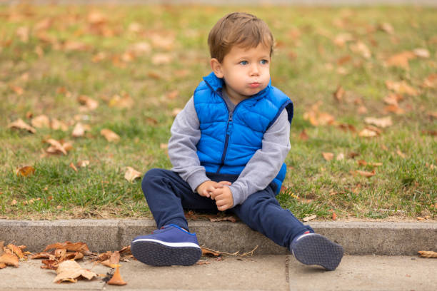 istock Sitting On A Curb And Puckering 1095599536