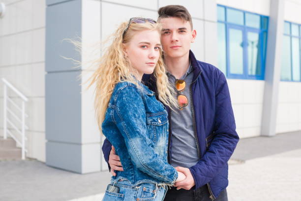 istock Girl and boy, jeans jacket, close up 1095605532