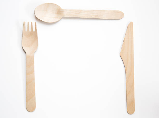 Wooden Cutlery in a dining place setting with copy space
