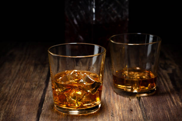 istock Two glass of whiskey with ice 1095608534
