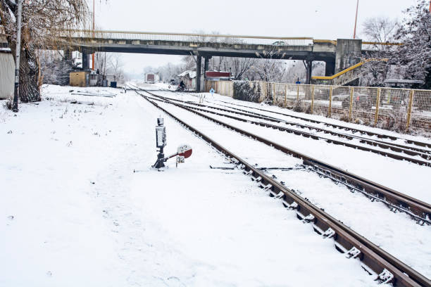 istock Railroad tracks in the snow 1095614836