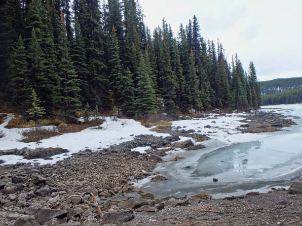 istock a frozen lake in the mountains 1095615634