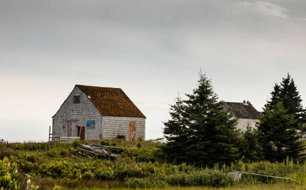 istock Two Deserted houses in Blue Rocks Nova Scotia Canada 1095617762
