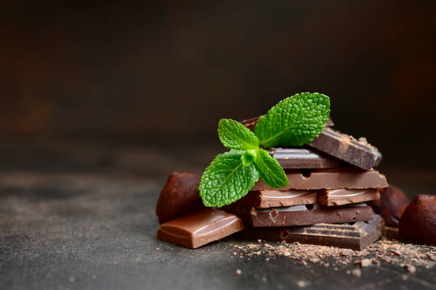istock Chocolate slices with fresh mint leaves 1095618580