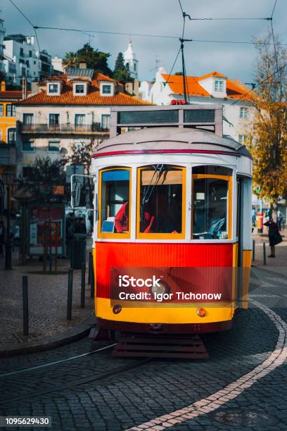 Vintage Old Red Tram In The City Center Of Lisbon City Touristic Landmarks Of Lisboa Lissabon Portugal Stock Photo - Download Image Now