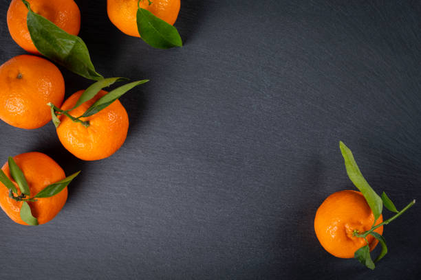 istock fresh tangerine fruits 1095638846