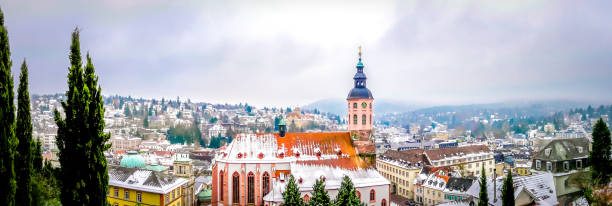 Panoramic view of Baden-Baden, Germany Panoramic view of Stiftskirche church with Baden-baden small cute town in winter fairytale in the Black Forest southwest of Germany. Famous German city with spa for vacations, holidays. baden baden stock pictures, royalty-free photos & images