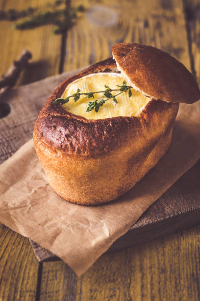 istock Camembert bread bowl on the wooden background 1095651246