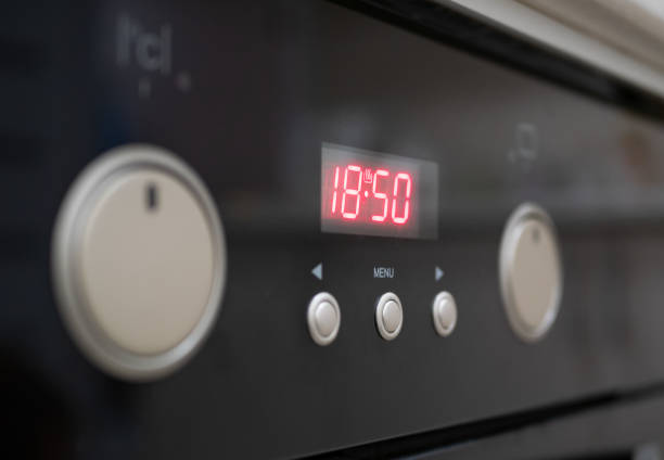 Man Baking Pizza Slice In Microwave Oven