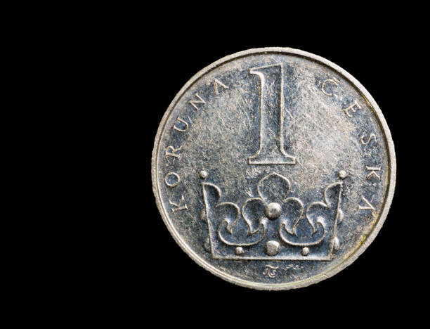 istock one Czech coin on black background 1095661682