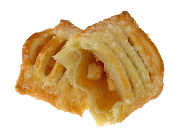 istock Broken pastry with apple filling isolated on a white background. 1095664512