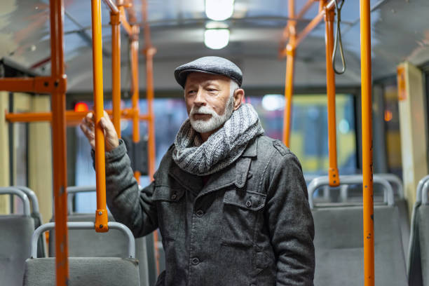 istock Mature Man Riding In A Bus 1095669826