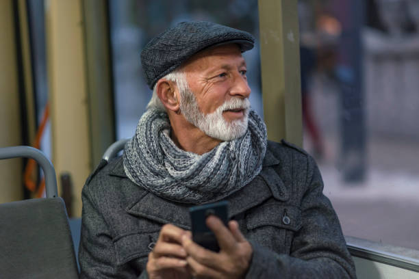 istock Mature Man Riding In A Bus 1095669870