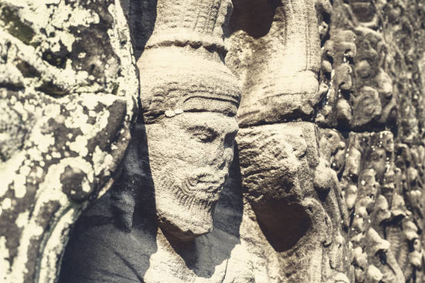 Stone carving in ancient temple in Angkor Was temples complex located in Siem Reap, Cambodia, South East Asia
