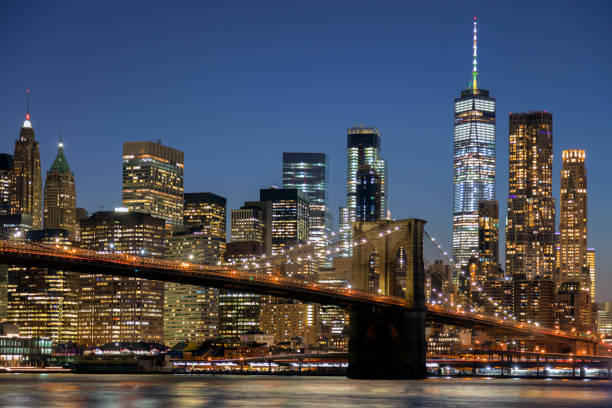 istock Manhattan, New York, Cityscape with Brooklyn Bridge at Night 1095680912