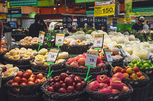A colorful display of fresh vegetables in a grocery market store.
