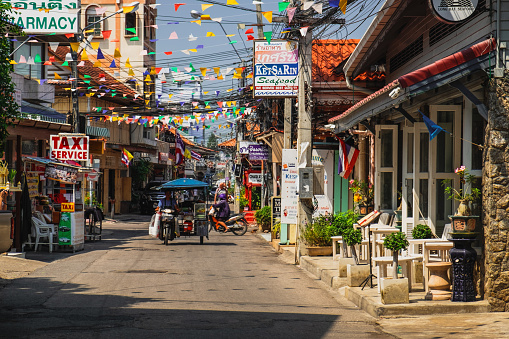 Hua Hin, Thailand - February 13, 2018: Typical street scene in Hua Hin. Hua Hin is a beach resort town near Bangkok, Thailand.