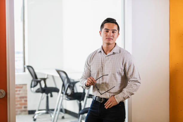 istock Young Vietnamese businessman in office 1095687732