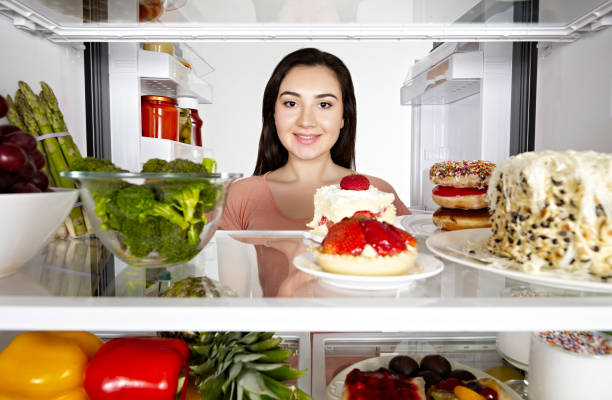 istock Woman and fridge 1095688078
