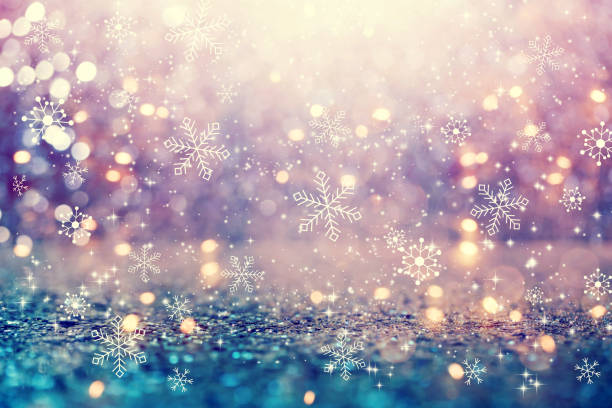istock Snowflakes on an abstract shiny light background 1095718916