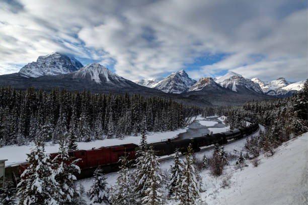 istock Morant's Curve with train in winter, Banff National Park, AB, Canada 1095724804