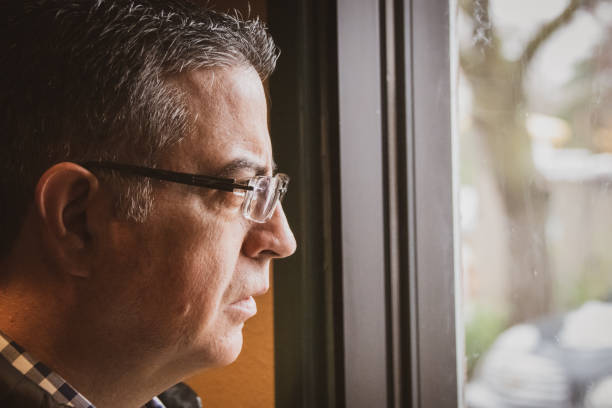 istock Serious mature man looking away 1095736770