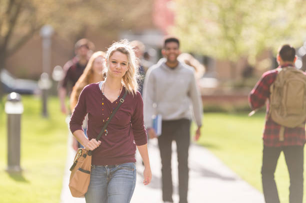 istock College students walking across campus to their classes 1095752794