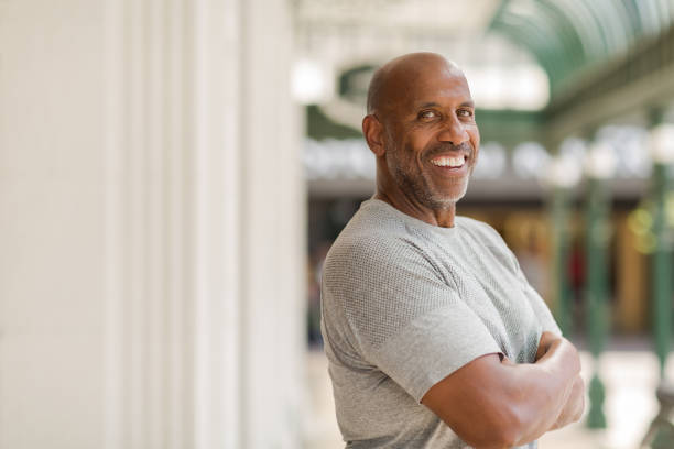 istock Happy mature African American man smiling outside. 1095770068