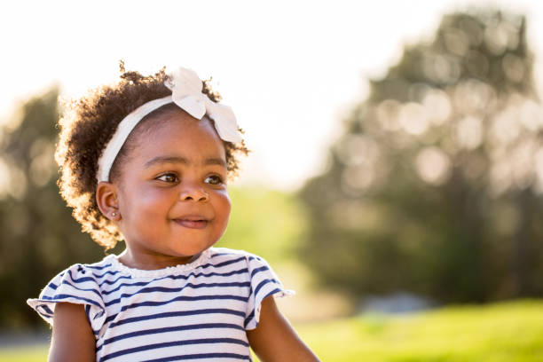 istock Sweet little girl smiling. 1095773476