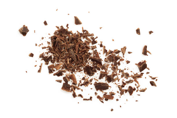 istock grated chocolate isolated on white background. Top view 1095773508