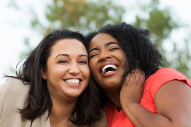 istock Multi-ethnic group of friends laughing. 1095774390