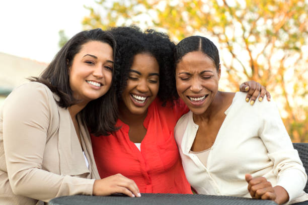 istock Multi-ethnic group of women laughing and talking. 1095774590