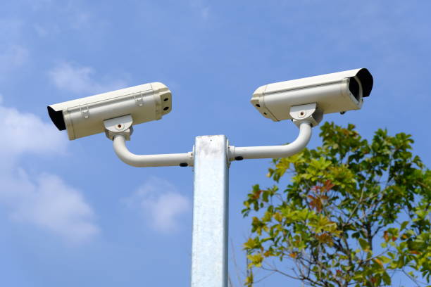 istock Closed-circuit camera or CCTV on the sky background. 1095778400