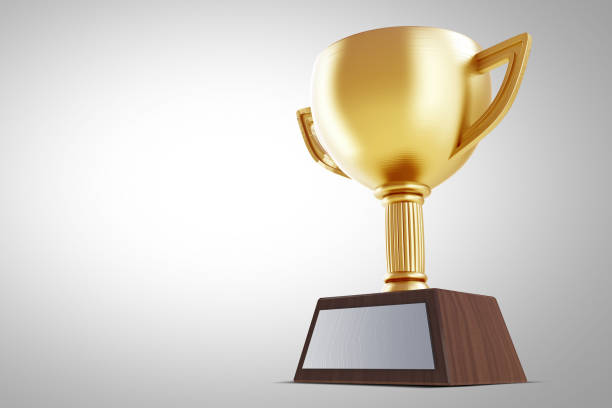 istock photo of gold trophy on background. 1095784624