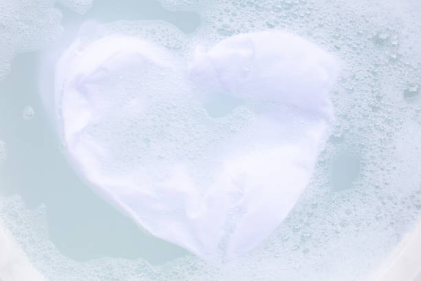 istock Soak cloth before washing, white t-shirt 1095788920