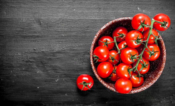 istock Ripe tomatoes in a bowl . 1095794414