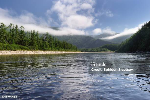 Maya River Tributary Of The Uda River Stock Photo - Download Image Now - Backgrounds, Beauty, Blue