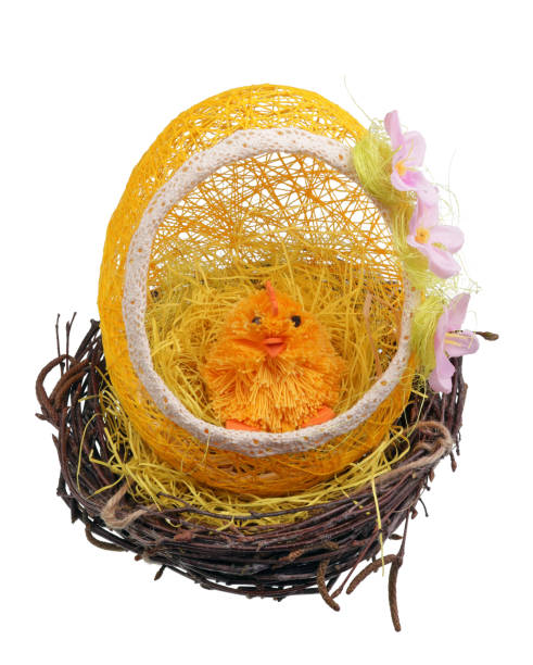 istock Easter handmade egg  and chicken  made of  thread  and paper in a nest 1095795190
