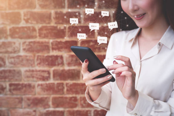 istock Woman using smartphone. Social media concept 1095797860