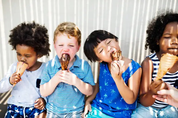 Photo of Children enjoying with ice cream