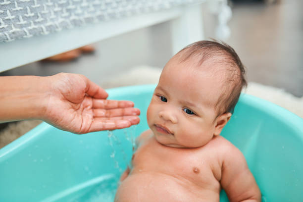 istock He's so sweet when it comes to bath time 1095808876
