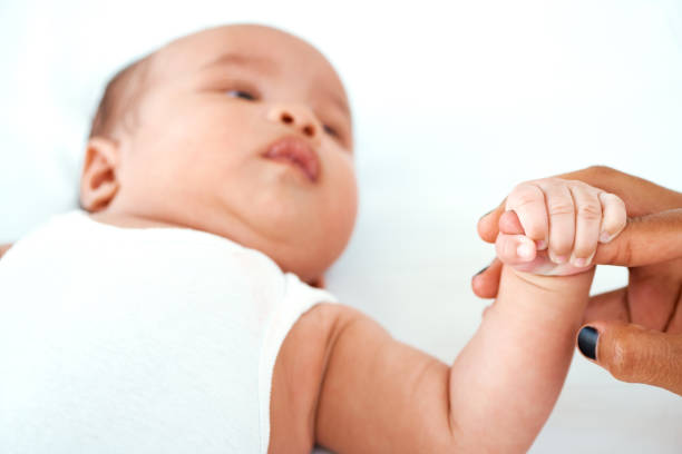 istock Mom's hand is one he can hold onto for life 1095811248