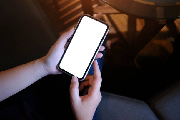 istock Women's hands holding cell telephone blank copy space screen. smart phone with technology concept. 1095813802