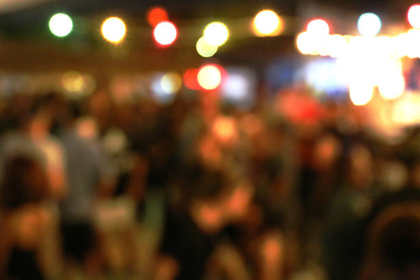istock Blurred background of many people had fun at a beach party 1095814372