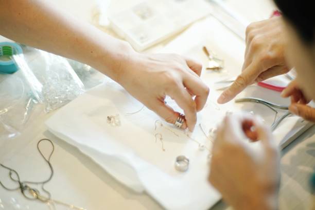istock Women making jewelry 1095825544