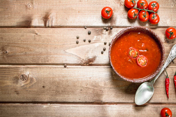 istock Tomato soup with spices and hot chili peppers. 1095825836