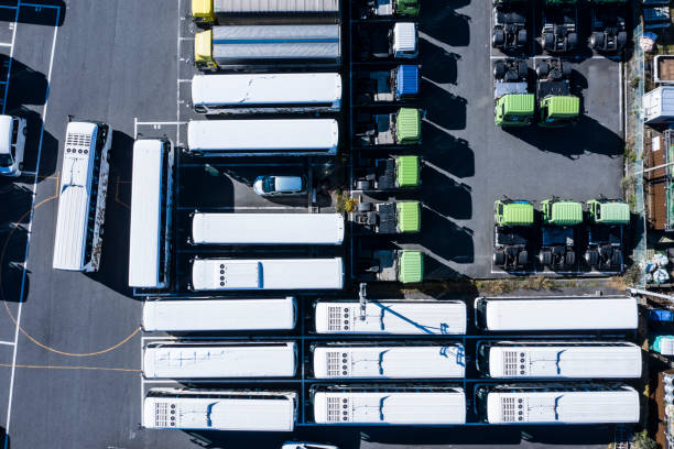 istock Parking lot with large trucks and buses 1095826754