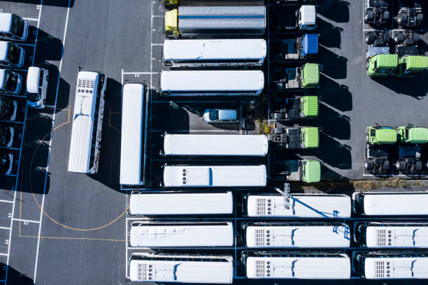 istock Parking lot with large trucks and buses 1095826918