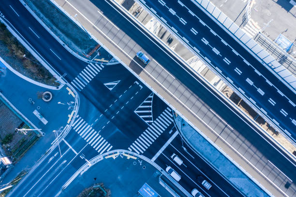 istock The car is running on an overlapping large road 1095826976
